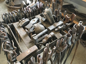 A rack of tools used in blacksmithing at Blackthorne Forge in Vermont.